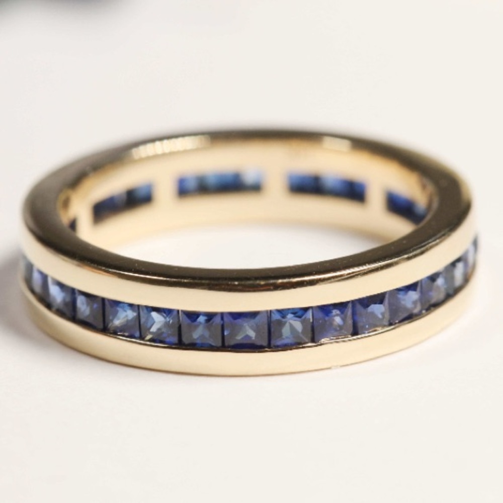 14k gold & sapphire channel set eternity ring (Sz 5.25)